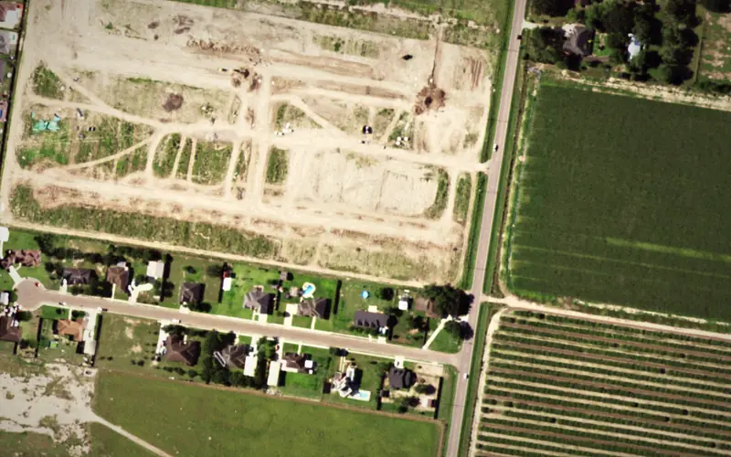 Aerial view of the area around The Orchards of San Juan I, San Juan
